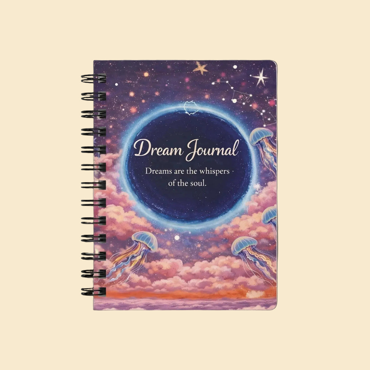 A spiral-bound dream journal with a cosmic jellyfish cover design, featuring the text 'Dream Journal' and 'Dreams are the whispers of the soul' on a soft cream background.