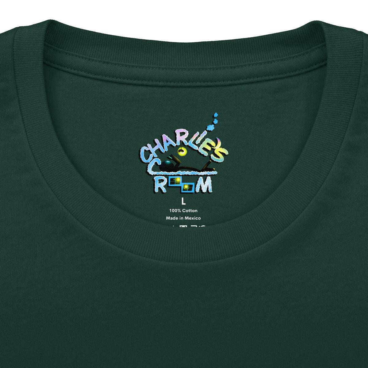 Close-up of a dark green crewneck t-shirt showing the inner neck print with the Charlie's Cozy Room brand logo, size L, and care details.